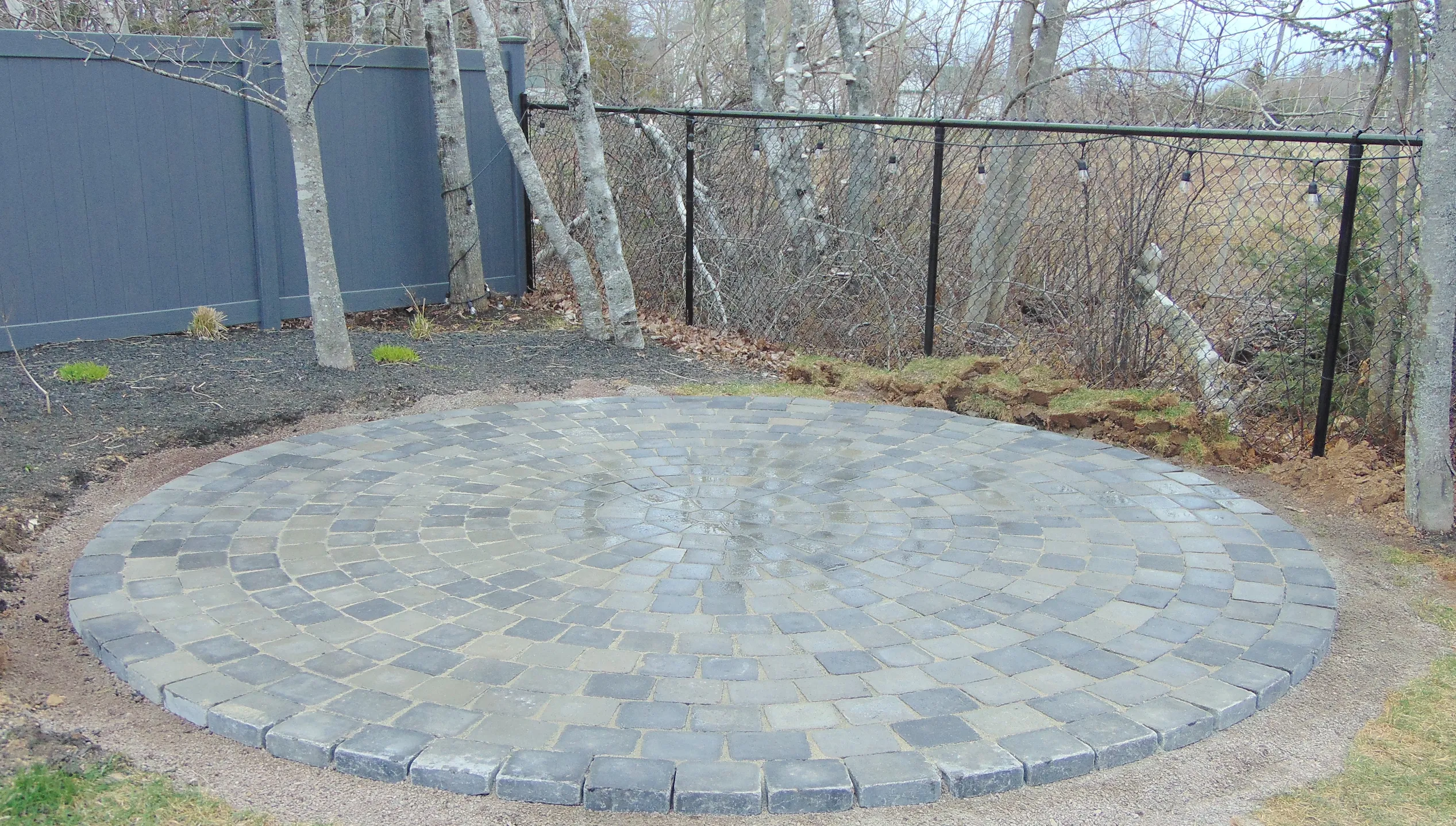 Large circular interlock patio laid in concentric rings