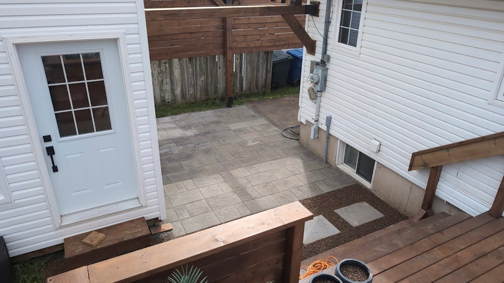 Overhead view of an interlock paver walkway connecting two buildings